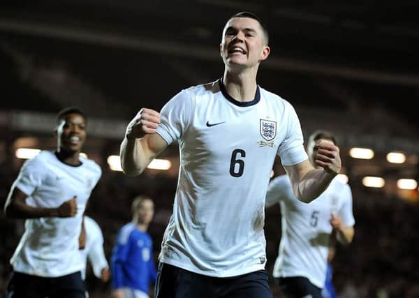 Michael Keane is in action for the England Under 21s tonight