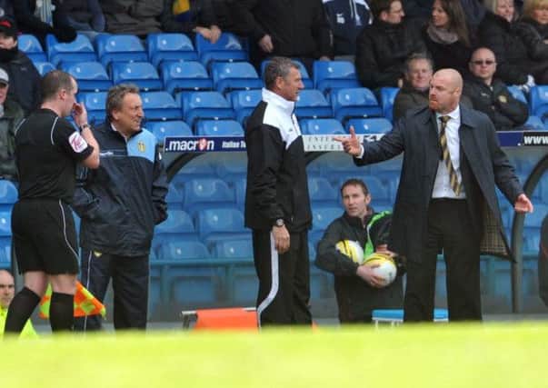 Big character: Neil Warnock, then Leeds United manager, in discussion with then-Watford boss Sean Dyche at Elland Road in March 2012