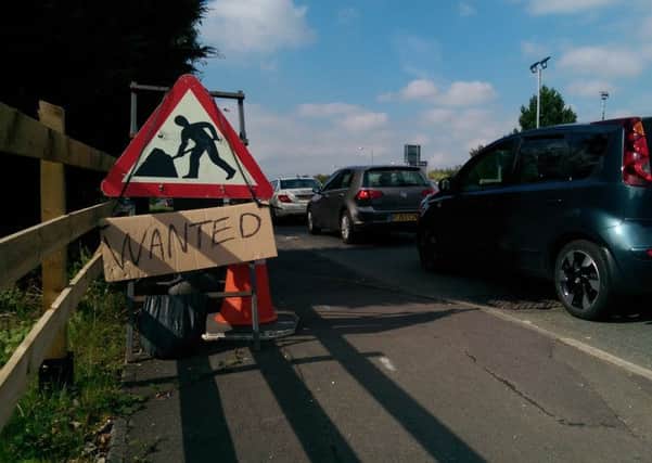 Seeing the funny side: Roadworks sign in Burnham Gate