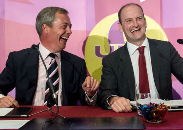 UKIP leader Nigel Farage (left) with  Douglas Carswell. Photo: Stefan Rousseau/PA Wire