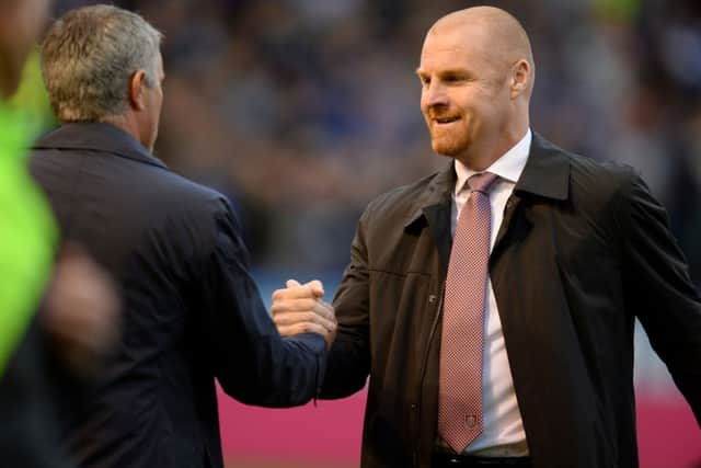 Sean Dyche greets Chelsea manager Jose Mourinho before the clash against Chelsea in August
