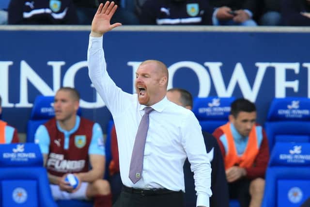 Burnley manager Sean Dyche during the Barclays Premier League match at the King Power Stadium, Leicester. PRESS ASSOCIATION Photo. Picture date: Saturday October 4, 2014. See PA story SOCCER Leicester. Photo credit should read: Mike Egerton/PA Wire. RESTRICTIONS: Editorial use only. Maximum 45 images during a match. No video emulation or promotion as 'live'. No use in games, competitions, merchandise, betting or single club/player services. No use with unofficial audio, video, data, fixtures or club/league logos.