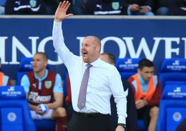 Burnley manager Sean Dyche during the Barclays Premier League match at the King Power Stadium, Leicester. PRESS ASSOCIATION Photo. Picture date: Saturday October 4, 2014. See PA story SOCCER Leicester. Photo credit should read: Mike Egerton/PA Wire. RESTRICTIONS: Editorial use only. Maximum 45 images during a match. No video emulation or promotion as 'live'. No use in games, competitions, merchandise, betting or single club/player services. No use with unofficial audio, video, data, fixtures or club/league logos.