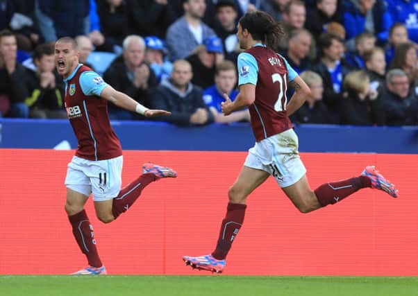 Drought over: Michael Kightly celebrates Burnleys first equaliser at Leicester with George Boyd - their first goal in 655 minutes