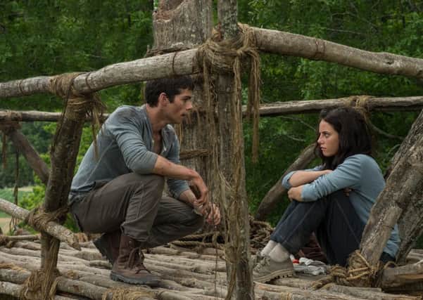 Undated Film Still Handout from The Maze Runner. Pictured:  Dylan O'Brian, Kaya Scodelario. See PA Feature FILM Film Reviews. Picture credit should read: PA Photo/Fox UK Film. WARNING: This picture must only be used to accompany PA Feature FILM Film Reviews