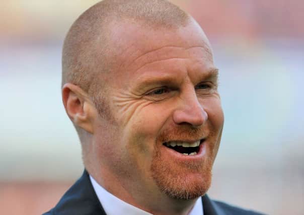 Burnley manager Sean Dyche during the Barclays Premier League match at Turf Moor, Burnley. PRESS ASSOCIATION Photo. Picture date: Sunday October 26, 2014. See PA story SOCCER Burnley. Photo credit should read: Lynne Cameron/PA Wire. Editorial use only. Maximum 45 images during a match. No video emulation or promotion as 'live'. No use in games, competitions, merchandise, betting or single club/player services. No use with unofficial audio, video, data, fixtures or club/league logos.