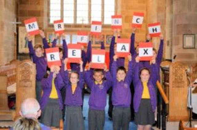 Alphabet tribute from children at John Cross CE School to retiring Rev Finch.