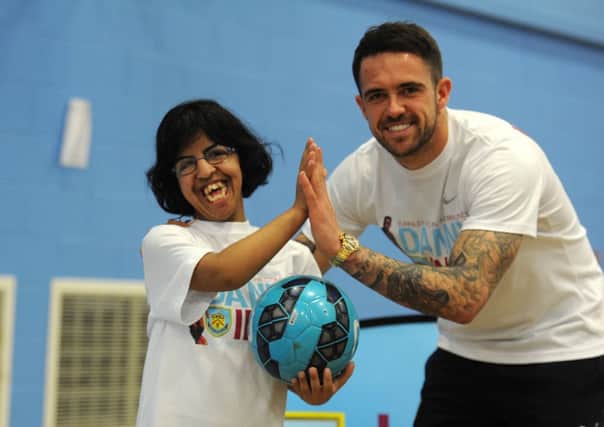 Clarets star Danny Ings launching a coaching project for disabled kids at Ridgewood School, Burnley.  Danny with Arrusa Jamil