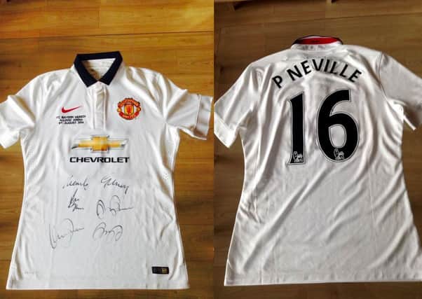 Phil Neville has donated a shirt from his personal collection which he wore at a legends game