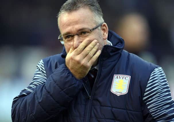 Aston Villa manager Paul Lambert during the Barclays Premier League match at Turf Moor, Burnley. PRESS ASSOCIATION Photo. Picture date: Saturday November 29, 2014. See PA story SOCCER Burnley. Photo credit should read: Clint Hughes/PA Wire. RESTRICTIONS: Editorial use only. Maximum 45 images during a match. No video emulation or promotion as 'live'. No use in games, competitions, merchandise, betting or single club/player services. No use with unofficial audio, video, data, fixtures or club/league logos.