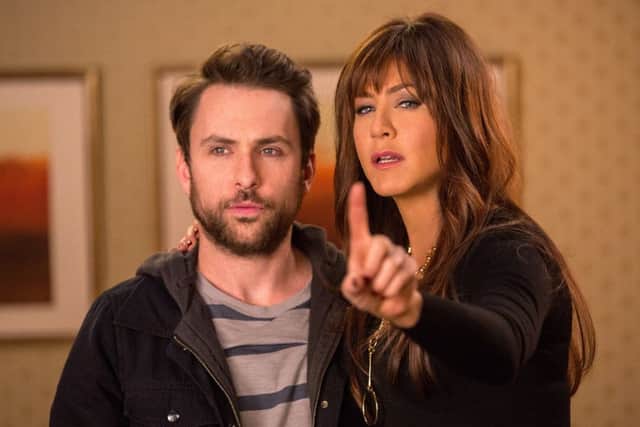 Undated Film Still Handout from Horrible Bosses 2. Pictured: Dale Arbus (CHARLIE DAY) and Dr Julia Harris (JENNIFER ANNISTON). See PA Feature FILM Aniston. Picture credit should read: PA Photo/Handout/Warner Bros/John P Johnson. WARNING: This picture must only be used to accompany PA Feature FILM Aniston.