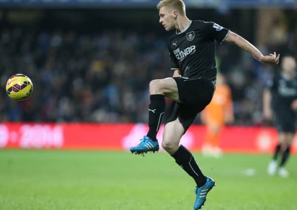 Mee machine: Defender Ben Mee was back in the Burnley side at QPR in the absence of Stephen Ward