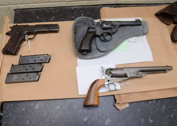 DEADLY HAUL: Some of the guns handed in to police