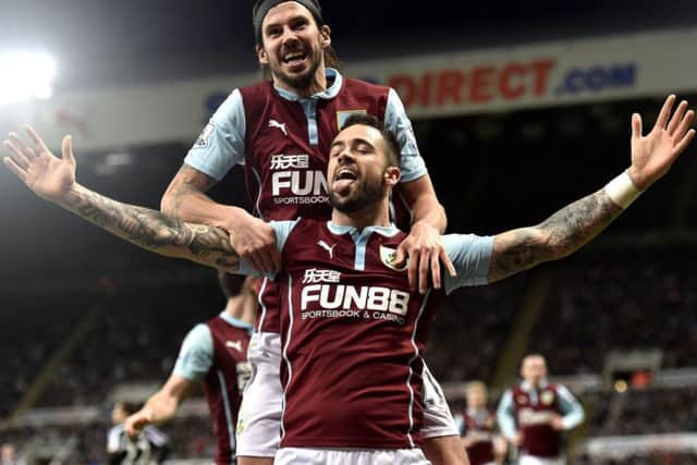 Burnley's Danny Ings celebrates scoring during the Barclays Premier League match at St James' Park, Newcastle. PRESS ASSOCIATION Photo. Picture date: Thursday January 1, 2015. See PA story SOCCER Newcastle. Photo credit should read: Owen Humphreys/PA Wire. Editorial use only. Maximum 45 images during a match. No video emulation or promotion as 'live'. No use in games, competitions, merchandise, betting or single club/player services. No use with unofficial audio, video, data, fixtures or club/league logos.