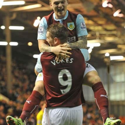 Burnley's Sam Vokes is congratulated on scoring his team's first goal to make the score 1-1 by team mate Kieran Trippier

Photographer Dave Howarth/CameraSport

Football - FA Challenge Cup Third Round - Burnley v Tottenham Hotspur - Monday 5th January 2015 - Turf Moor - Burnley

 © CameraSport - 43 Linden Ave. Countesthorpe. Leicester. England. LE8 5PG - Tel: +44 (0) 116 277 4147 - admin@camerasport.com - www.camerasport.com