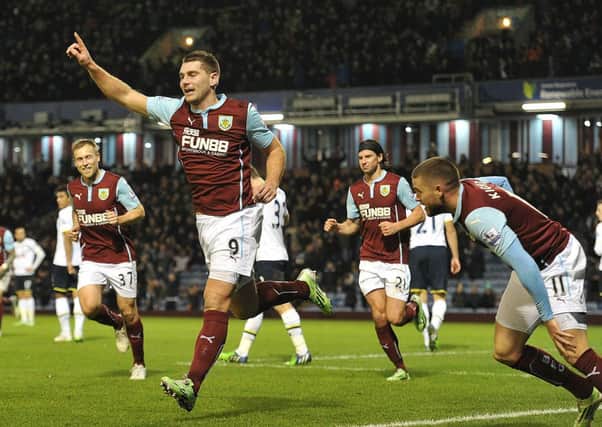 Big moment: Sam Vokes celebrates scoring on his second appearance back in a Burnley shirt after a long injury absence