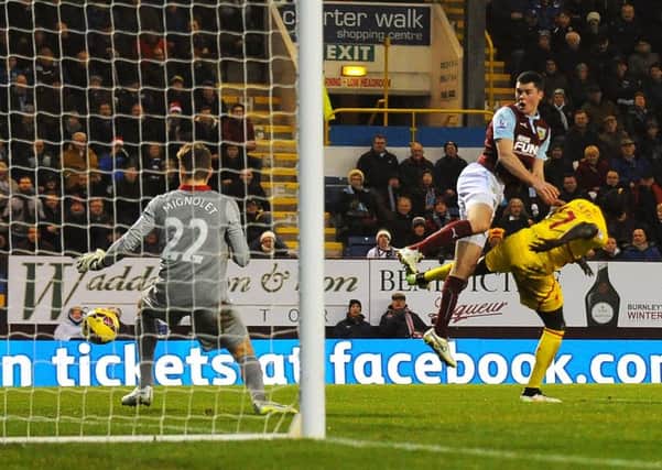On-loan defender Michael Keane watches his header go wide of the far post in the Boxing Day defeat against Liverpool