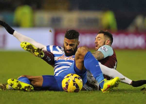 Burnley's Danny Ings battles with Queens Park Rangers' Armand Traoré.  

Photo: Dave Howarth/CameraSport

Football