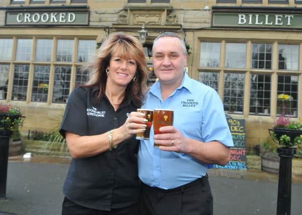 Alison Leigh and Paul Miller from the Crooked Billet celebrate being voted the best bar in Burnley.