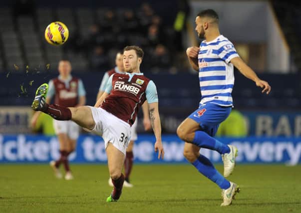 Burnley's Ashley Barnes gets to the ball first. 

Photographer Dave Howarth/CameraSport

Football