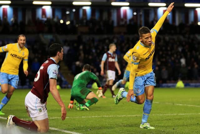 Crystal Palace's Dwight Gayle celebrates scoring his sides third goal of the game during the Barclays Premier League match at Turf Moor, Burnley. PRESS ASSOCIATION Photo. Picture date: Saturday January 17, 2015. See PA story SOCCER Burnley. Picture credit should read: Lynne Cameron/PA Wire. RESTRICTIONS: Editorial use only. Maximum 45 images during a match. No video emulation or promotion as 'live'. No use in games, competitions, merchandise, betting or single club/player services. No use with unofficial audio, video, data, fixtures or club/league logos.