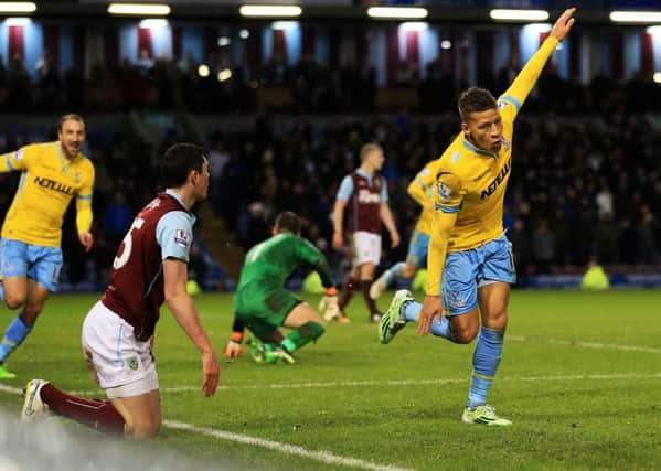 Crystal Palace's Dwight Gayle celebrates scoring his sides third goal of the game during the Barclays Premier League match at Turf Moor, Burnley. PRESS ASSOCIATION Photo. Picture date: Saturday January 17, 2015. See PA story SOCCER Burnley. Picture credit should read: Lynne Cameron/PA Wire. RESTRICTIONS: Editorial use only. Maximum 45 images during a match. No video emulation or promotion as 'live'. No use in games, competitions, merchandise, betting or single club/player services. No use with unofficial audio, video, data, fixtures or club/league logos.