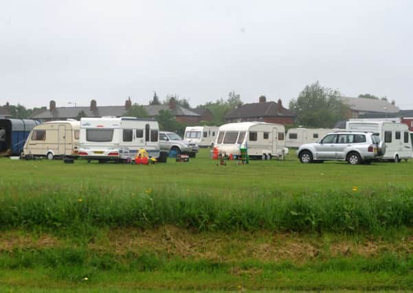Gypsies on field at Middleton Park Avenue, Leeds