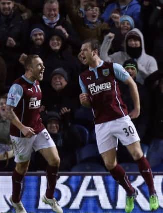 Burnley's Ashley Barnes celebrates scoring the first goal during the Barclays Premier League match at Turf Moor, Burnley. PRESS ASSOCIATION Photo. Picture date: Saturday December 13, 2014. See PA story SOCCER Burnley. Photo credit should read Peter Byrne/PA Wire. Editorial use only. Maximum 45 images during a match. No video emulation or promotion as 'live'. No use in games, competitions, merchandise, betting or single club/player services. No use with unofficial audio, video, data, fixtures or club/league logos.
