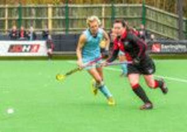 Lisa Crewe, right, in action for Bowdon Hightown