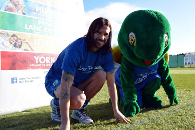 George Boyd and mascot Thommo at the launch of the Pennine 10k at Carrington