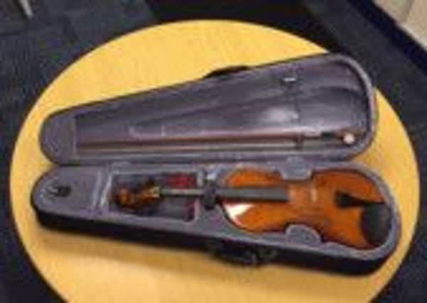 A violin that has been handed into Burnley Police Station. (s)