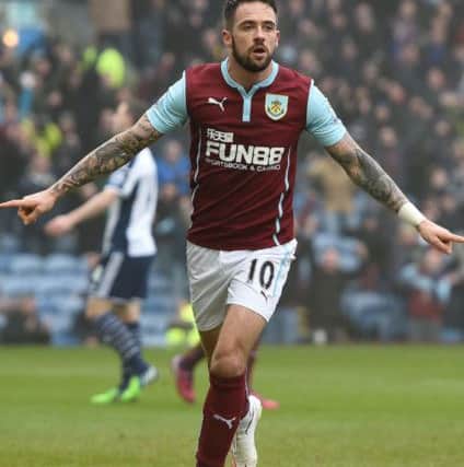 Burnley's Danny Ings celebrates scoring his teams second goal against West Bromwich Albion, during the Barclays Premier League match at Turf Moor, Burnley. PRESS ASSOCIATION Photo. Picture date: Sunday February 8, 2015. See PA story SOCCER Burnley. Photo credit should read: Martin Rickett/PA Wire. RESTRICTIONS: Editorial use only. Maximum 45 images during a match. No video emulation or promotion as 'live'. No use in games, competitions, merchandise, betting or single club/player services. No use with unofficial audio, video, data, fixtures or club/league logos.