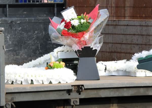 Flowers at funeral. Picture: Andrew Roe