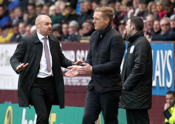 Burnley manager Sean Dyche and Swansea City manager Garry Monk on the touchline. Photographer Rich Linley/CameraSportFootball