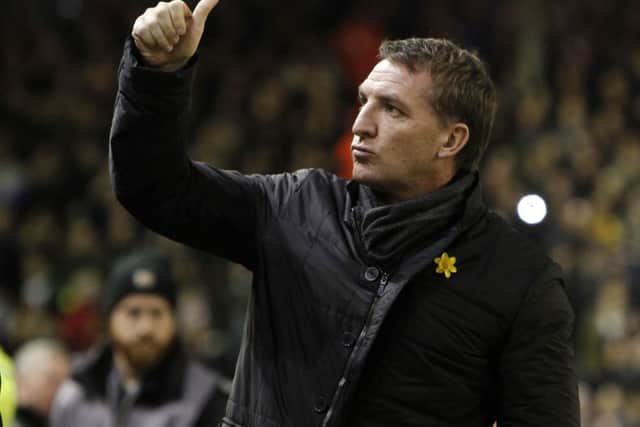 Liverpool manager Brendan Rodgers believes Sean Dyche can keep Burnley in the Premier League