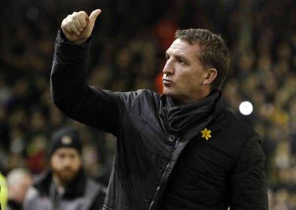 Liverpool manager Brendan Rodgers believes Sean Dyche can keep Burnley in the Premier League