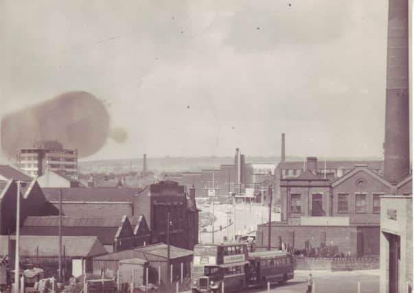Centenary Way from the South West. this picture shows all of the buildings mentioned in the text, but from a different perspective. From the left, the Keirby, the Generating Station, the huge Ribble Garage, the Destructor Plant (showing the giant chimney) with Basket Street Works and the Odeon in the background.
