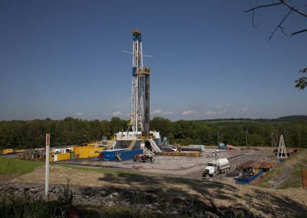 Fracking rigs like this one are a common sight in America