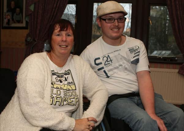 Debbie Hughes with her son Ryan Cooper who has finally received his compensation after his accident 16 years ago.