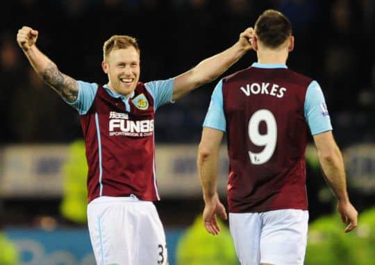 Scott Arfield and Sam Vokes celebrate at the full time whistle