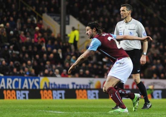 George Boyd turns to celebrate after volleying the Clarets into the lead