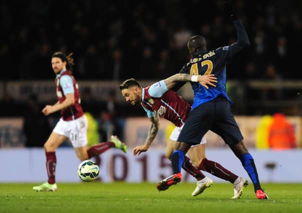 Danny Ings escapes the attentions of Manchester City's Yaya Toure