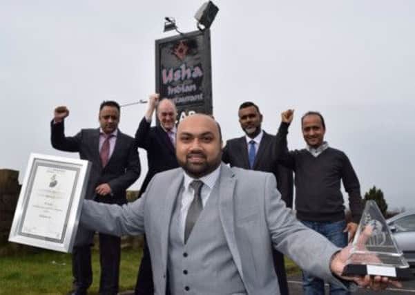 Ibby Ali after winning the Outstanding Achievement in the Curry Industry. (s)