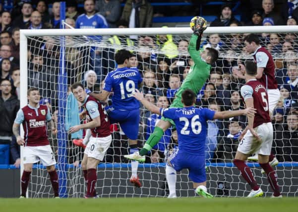 Keeper Tom Heaton, pictured in the 1-1 draw at Chelsea, believes Michael Duff is the best professional Ive played with.