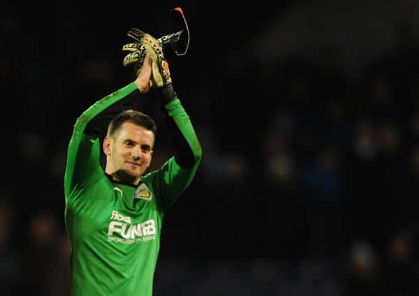 Tom Heaton applauds the fans after victory over Manchester City