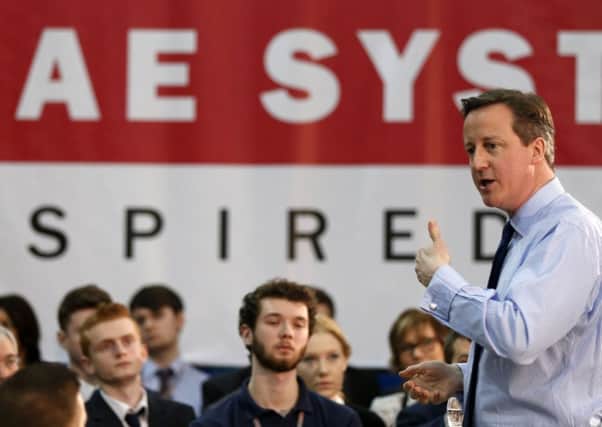 Prime Minister David Cameron talks during a visit to BAE Systems, in Preston. Photo: Lynne Cameron/PA Wire