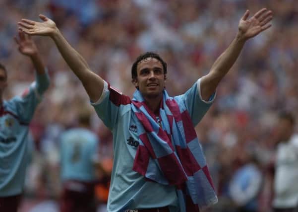 Wembley winner: Michael Duff celebrates promotion to the Premier League after the 2009 Championship Play-Off Final against Sheffield United in 2009