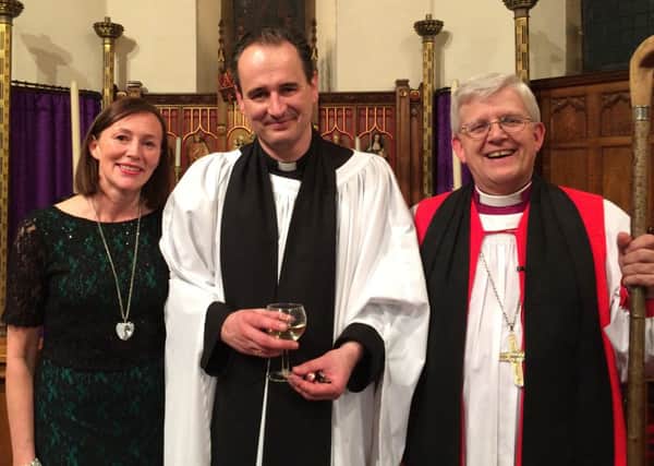 The new vicar of Read and Simonstone, the Rev. Robert Fielding, with his wife Jayne and the Bishop of Blackburn, the Rt Rev. Julian Henderson. (s)