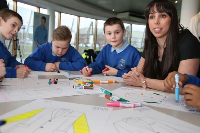 Beth Tweddle with pupils from Altham Primary School at SimonJersey for the launch of the new competition giving schhol children the chance to have their message in lining of the kit for the games in Rio.