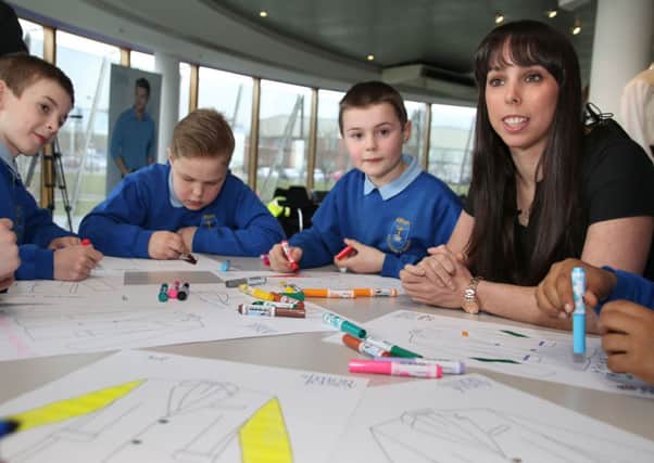Beth Tweddle with pupils from Altham Primary School at SimonJersey for the launch of the new competition giving schhol children the chance to have their message in lining of the kit for the games in Rio.